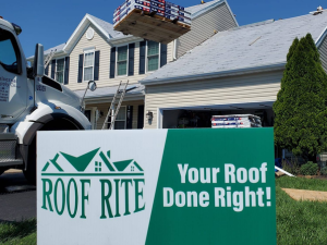 Best roofers in Bethany Beach repairing hail damage at a local home.